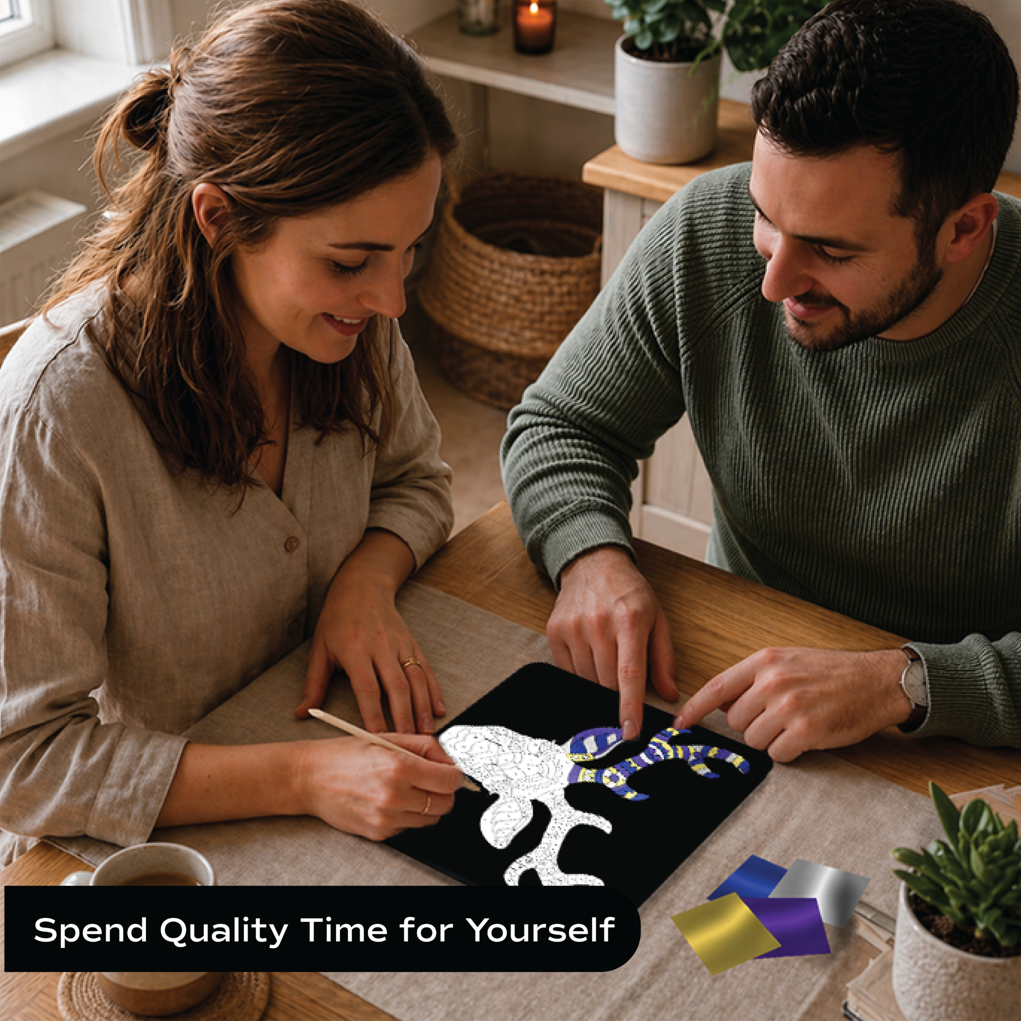 Couple doing Unwynd Foil by Number Animals foil art kit together – mindful craft activity for adults with elephant mandala board