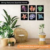 All 6 completed Unwynd Foil by Number Under The Sea mandala boards displayed as wall art – jellyfish fish turtle starfish shell manta ray metallic foil designs