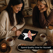 Two women doing Unwynd Foil by Number starfish mandala foil art kit – mindful craft hobby for adults and friends